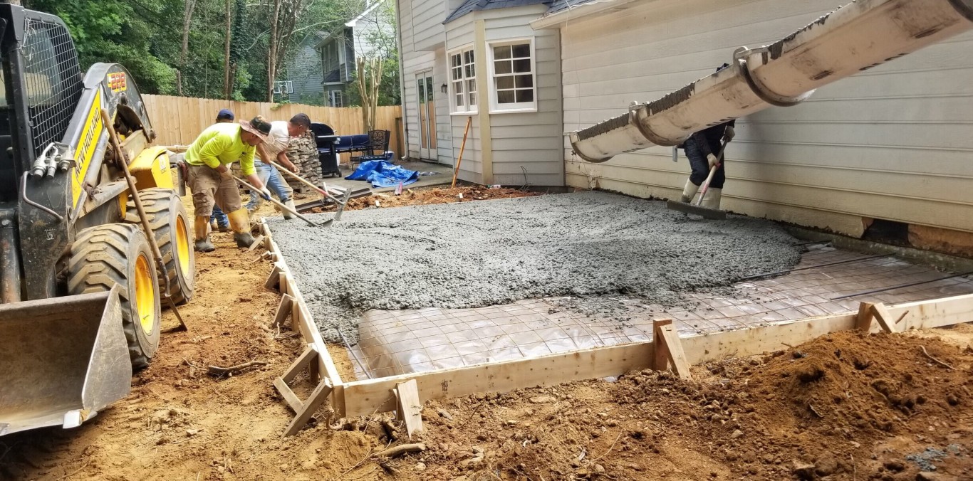 Professional concrete crew preparing site in Sayreville, NJ